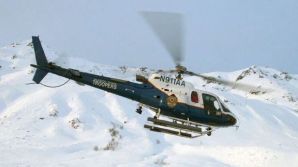 Associated Press/Alaska State Troopers - This 2008 image provided by the Alaska State Troopers shows their helicopter which crashed Saturday night March 30, 2013 while attempting to rescue a snowmobiler near Larson Lake 7 miles east of Talkeetna, Alaska. All three aboard are feared dead. (AP Photo/Alaska State Troopers)
